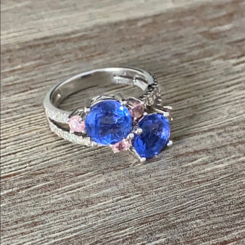 Hardly worn sterling silver blue topaz ring